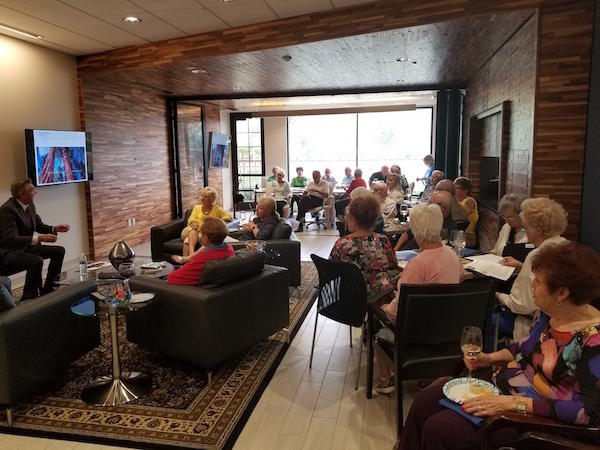 Audience enjoying wine and chocolate