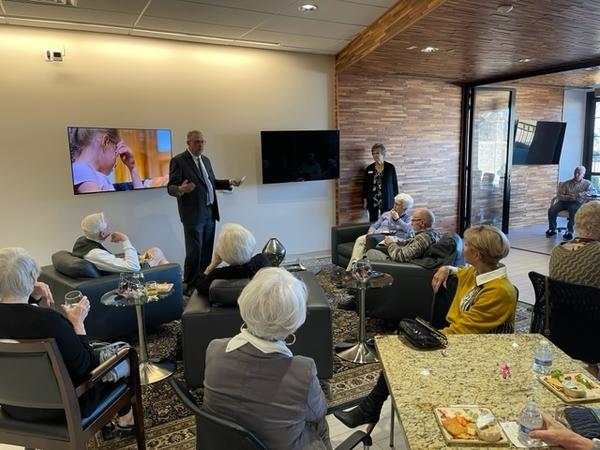 Greg Furseth, Chief Fiduciary Officer, TrustBank and Lois Eitel, Past President, Assitance League of the Valley present at Wine & Chocolate.